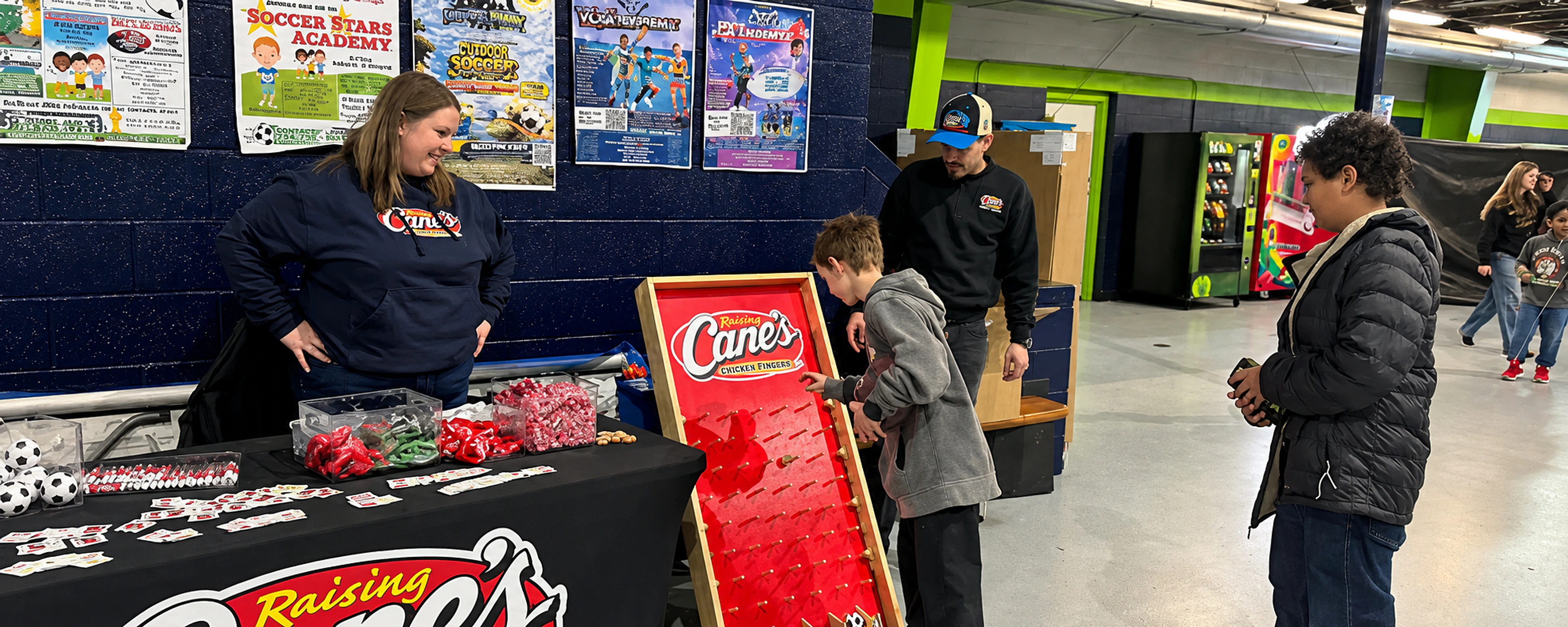 Raising Cane's sponsorship table at Maumee Soccer Centre